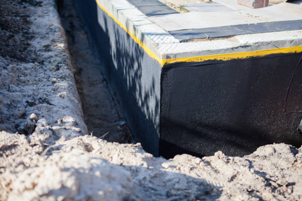 Professional Emergency Waterproofing technician working in Great Falls, VA